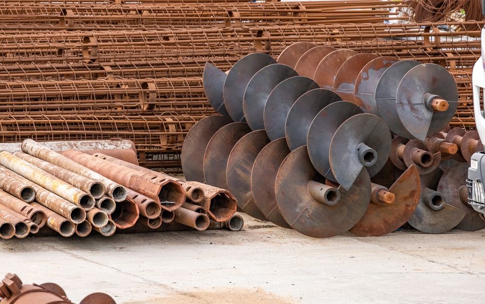 rusty metal pipes in an industrial yard